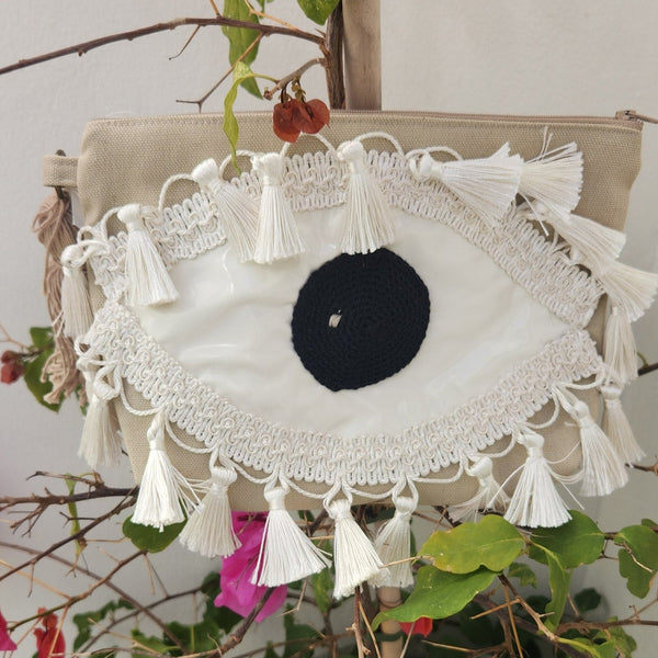 Beige tassel clutch bag