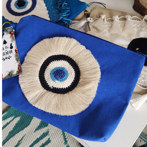 Navy clutch bag with tassels