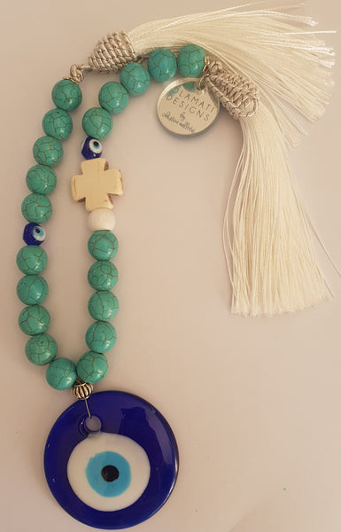 Turquise blue round bead mati wall hanging with beige cross and tassel