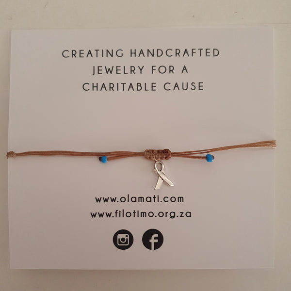 Filotimo Shell and mati bangle with Cancer ribbon