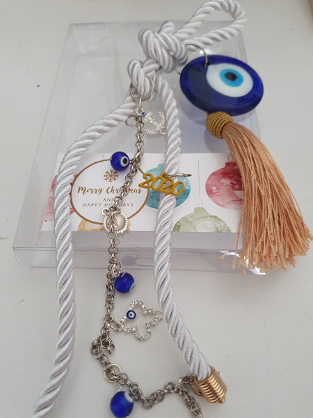 White gouri with gold tassel