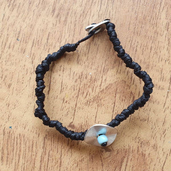 Black disk bracelet