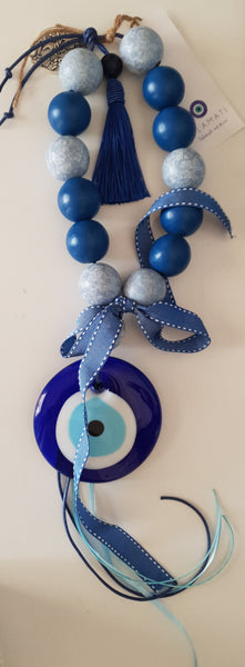 Blue mati wall hanging with large wooden beads, pomegranate and blue tassel