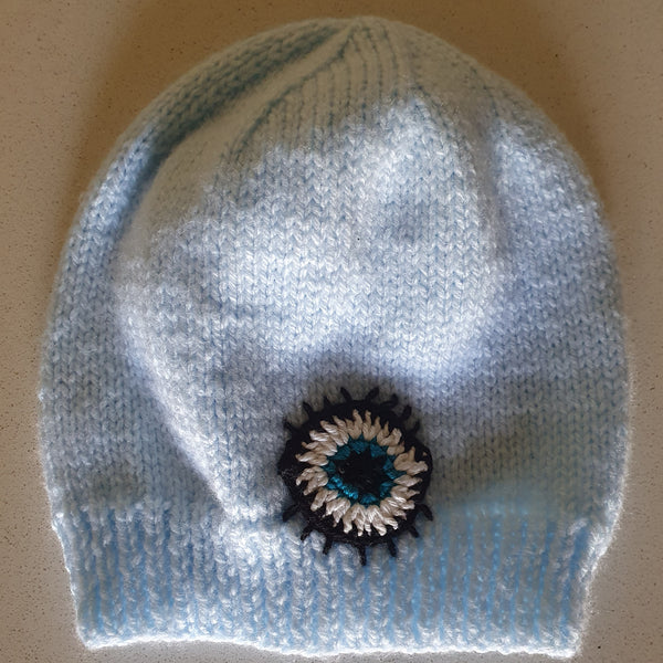 Hand knitted mati eye beanies