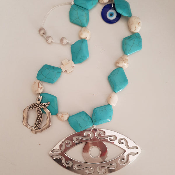 Silver and turquise mati wall hanging