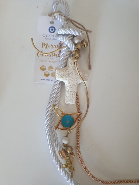 White gouri with gold mati, beige cross and gold tassel