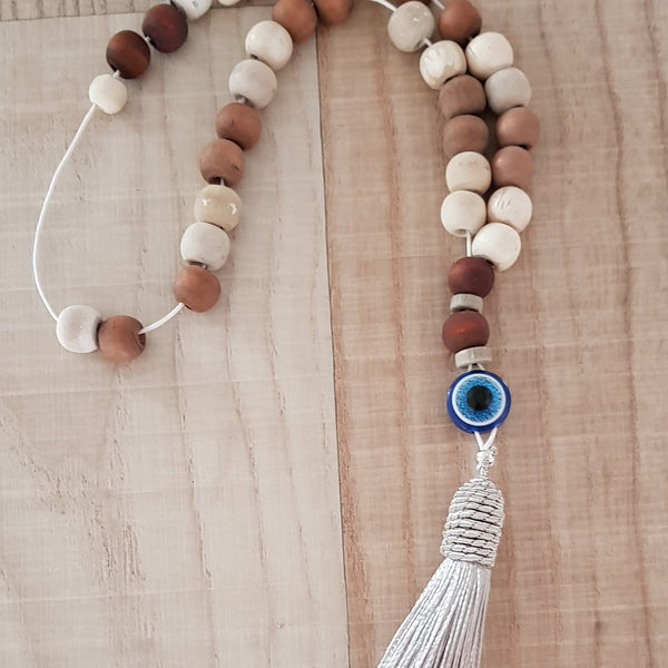 Brown and beige bead komboloi with tassel