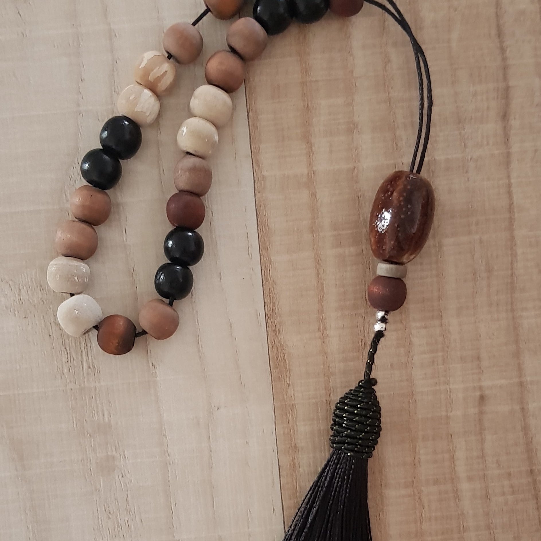 Black and brown wood bead komboloi with back tassel