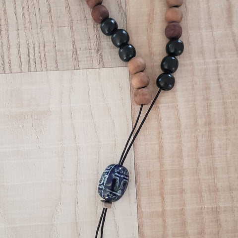 Black and brown wood bead komboloi with evil eye beads