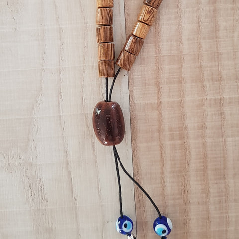 Light brown bead komboloi with mati beads
