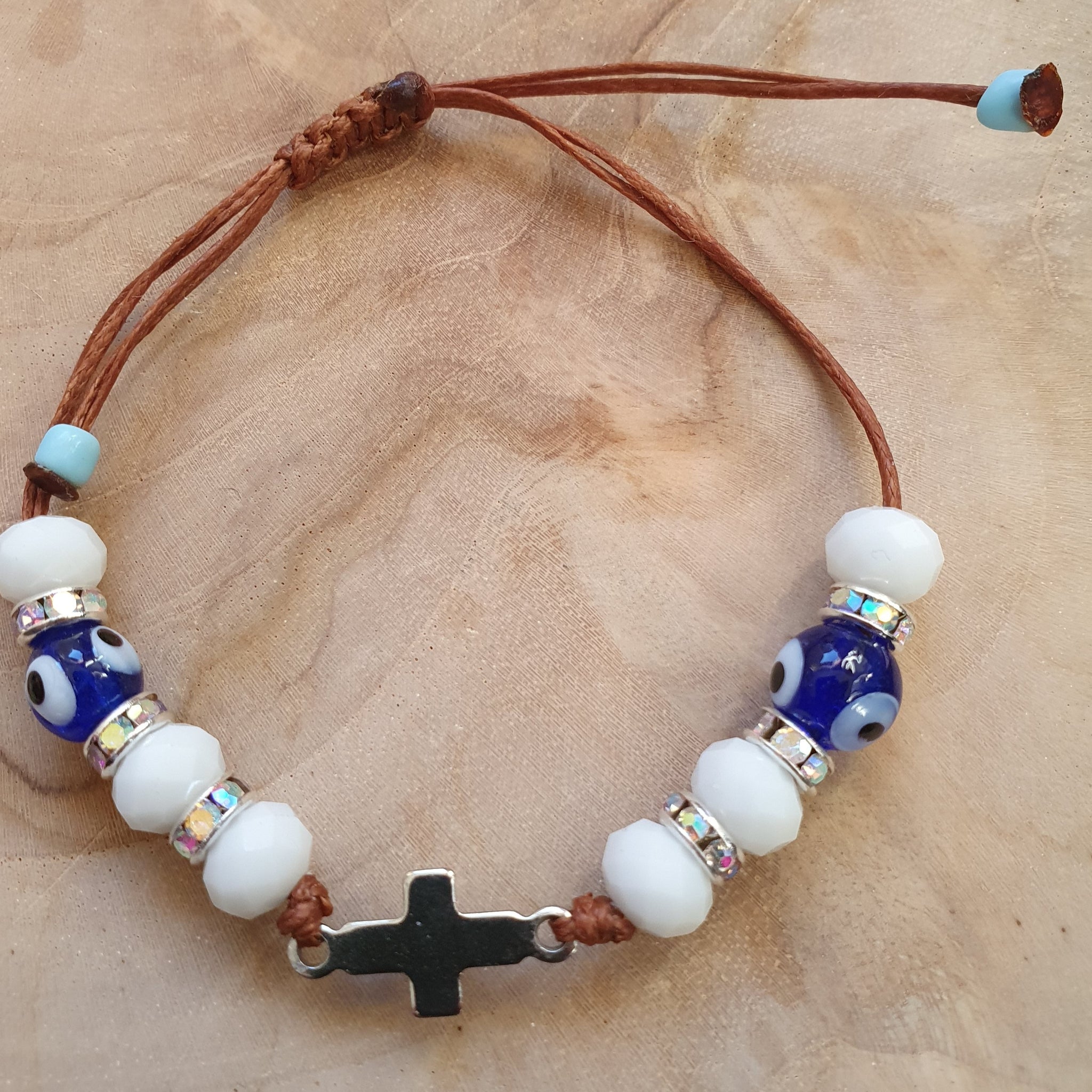 White_bead_bracelet_with_mati_and_cross