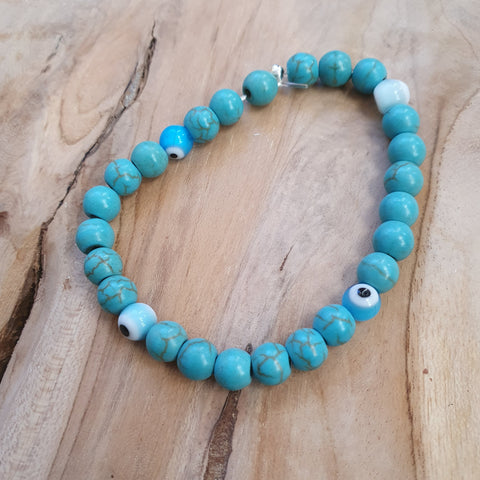 Ladies blue stone beads with evil eye