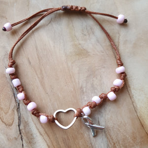 Silver stainless steel heart bracelet with pink beads