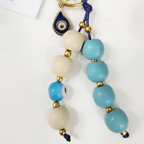 Turquoise blue and beige bead keyring with mati